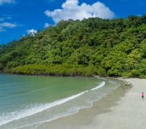 Stroll along the Cape Tribulation Beach beach and boardwalk to the photographers' platform overlooking the mountains and coast where the 'Rainforest meets the Reef'