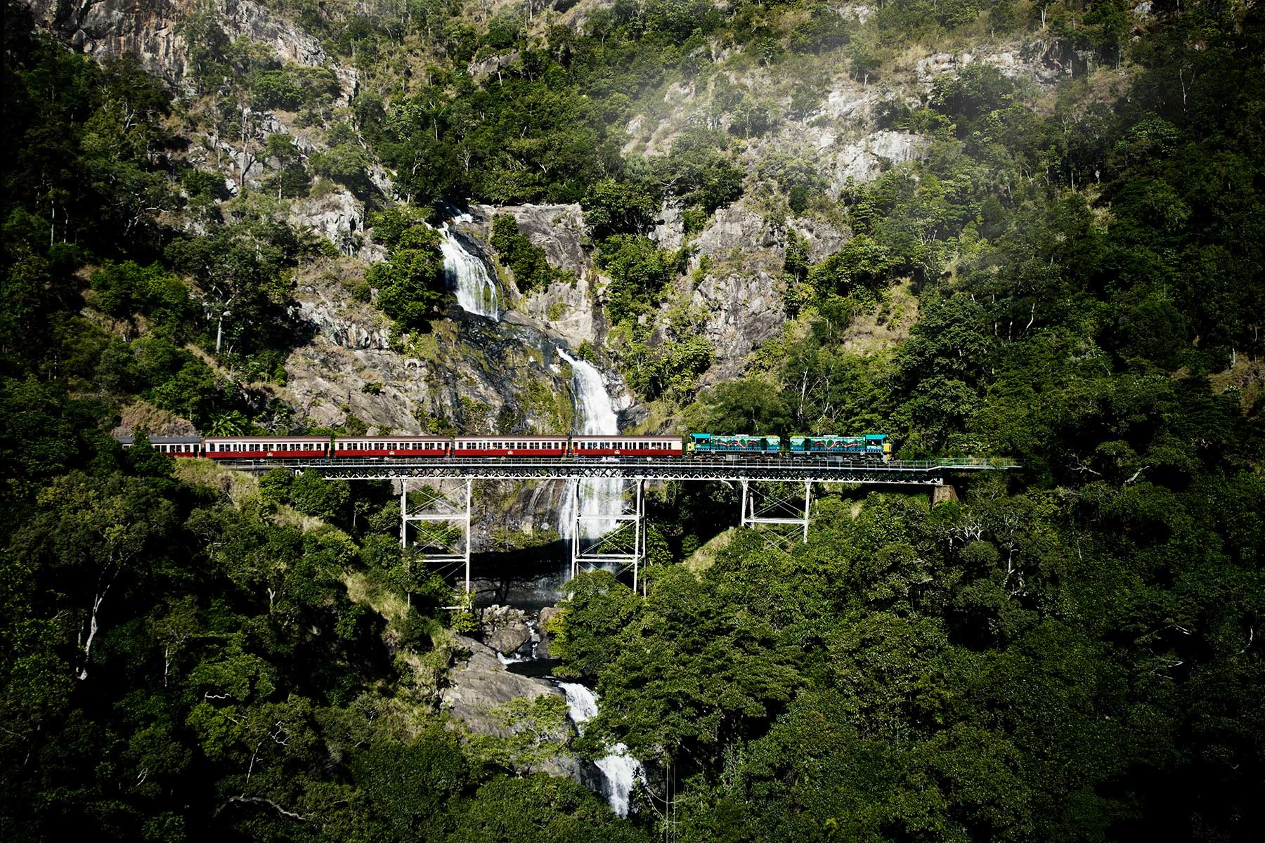 Kuranda Scenic Rail passing by Stoney Creek Falls