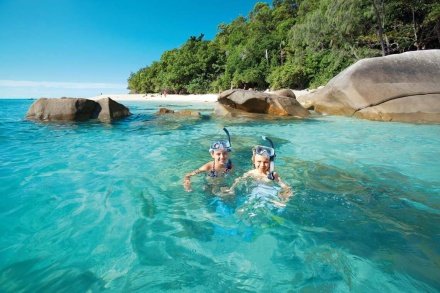 Kids swimming in the ocean at Fitzroy Island