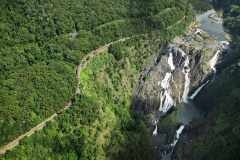 Kuranda Scenic Railway passing the Red Bluff rock face. 